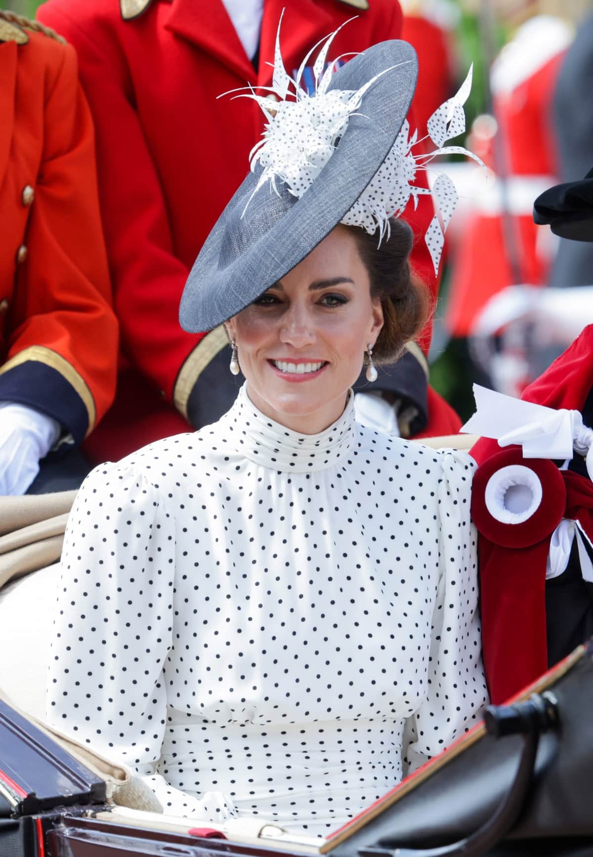 Catherine, Princess of Wales wearing a bespoke fascinator hat by Philip Treacy with Collingwood pearl and diamond earrings