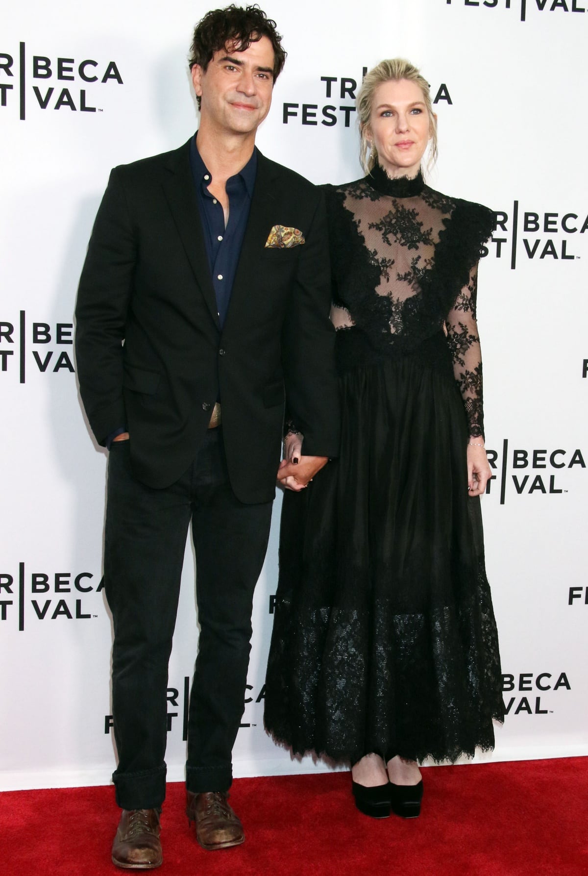 Hamish Linklater and Lily Rabe attended the Downtown Owl world premiere at the Tribeca Festival, with Rabe wearing a dramatic black lace Zimmermann gown and platform black pumps that added extra height beside her husband