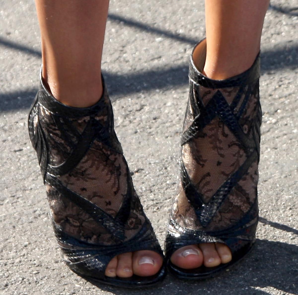 Kerry Washington steps out in edgy black lace peep-toe Jimmy Choo booties