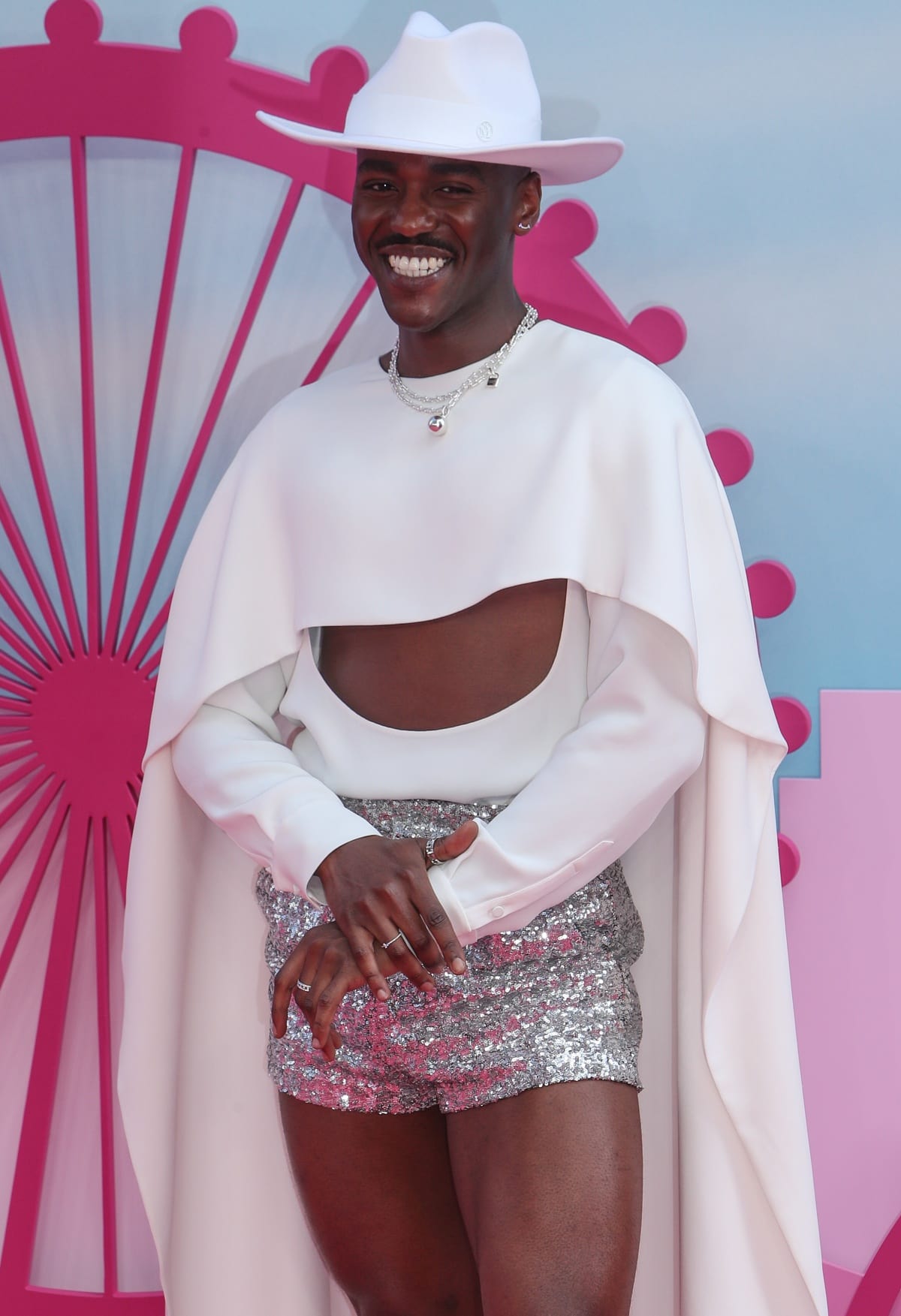 Ncuti Gatwa accessorized with pieces from Tiffany Co. and a Maison Michel white wide-brimmed cowboy hat