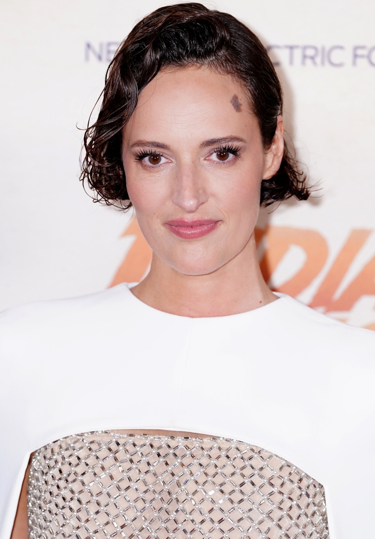 Phoebe Waller-Bridge parted her cropped brunette locks to the side to show off her flawless beauty look