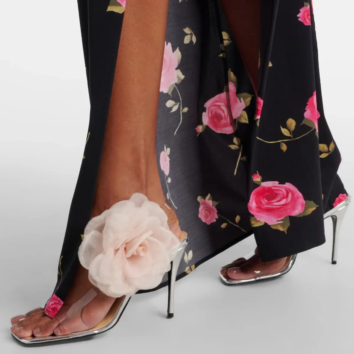 These luxurious organza flower PVC sandals in mirror pink feature a large silk-organza tulle flower appliqué at the ankle, adding a touch of elegance to the minimalist design with a 105mm heel