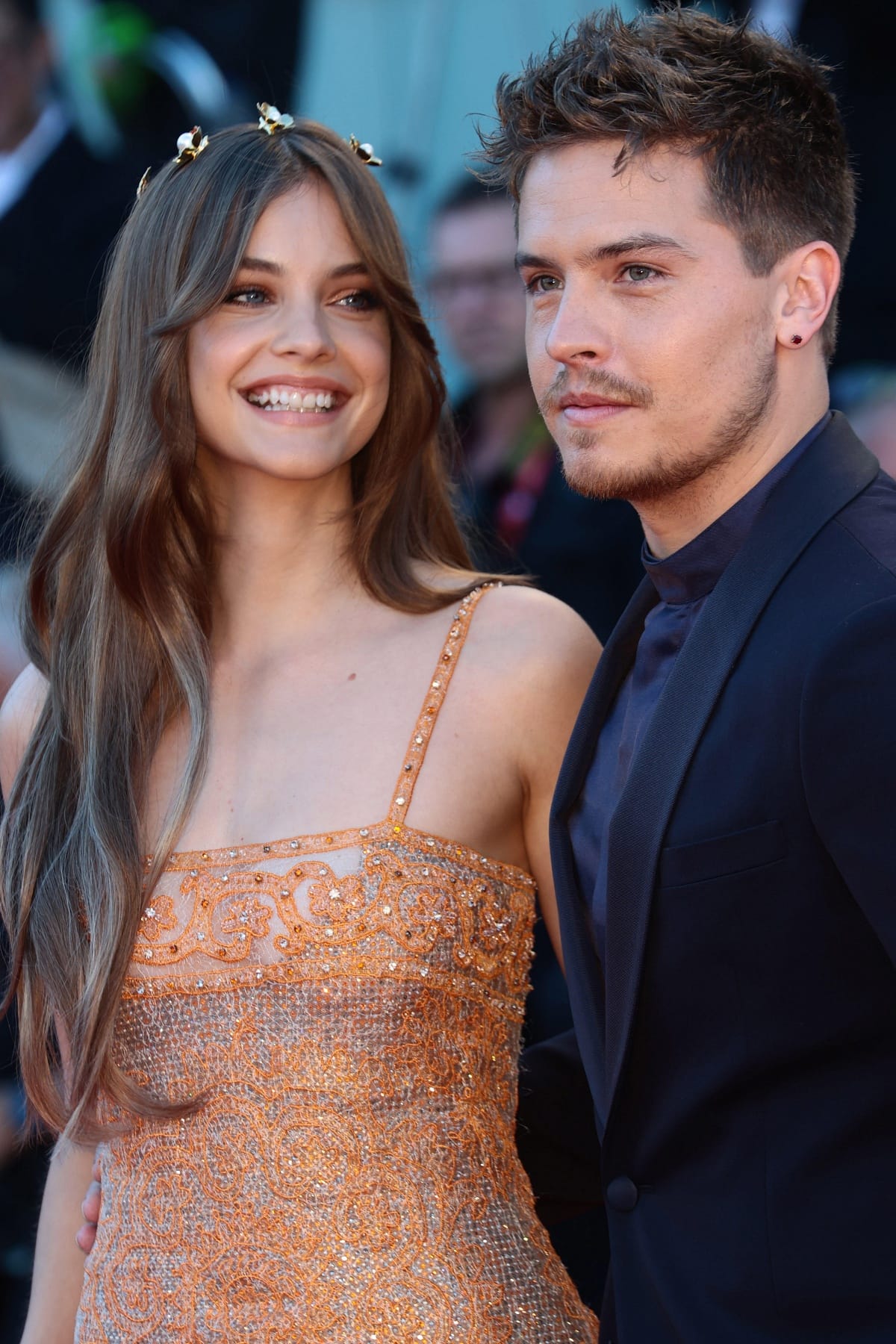 Barbara Palvin stuns in a sparkling, intricately beaded orange Armani Privé Couture Spring 2017 gown alongside Dylan Sprouse in a sleek midnight navy tuxedo at the Venice Film Festival opening ceremony