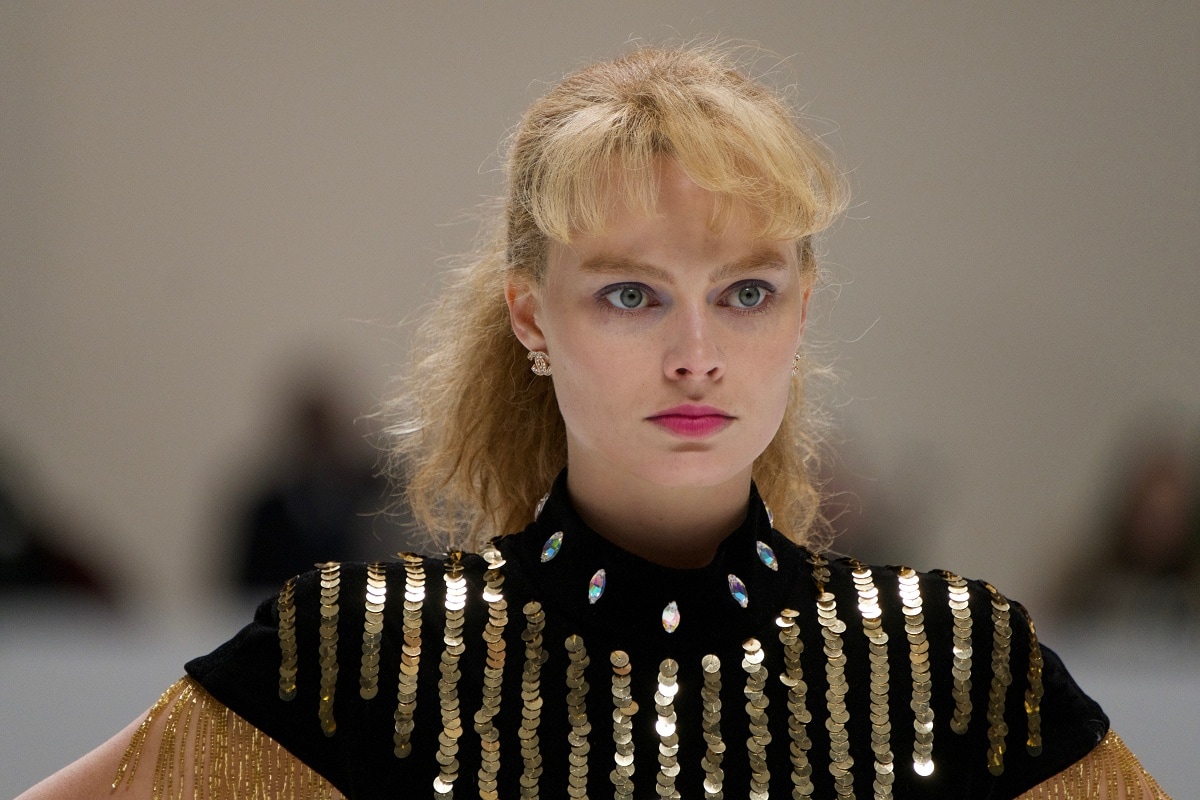 Margot Robbie transforms into disgraced figure skater Tonya Harding in I, Tonya (2017), delivering an intense and emotionally charged performance that earned her an Academy Award nomination