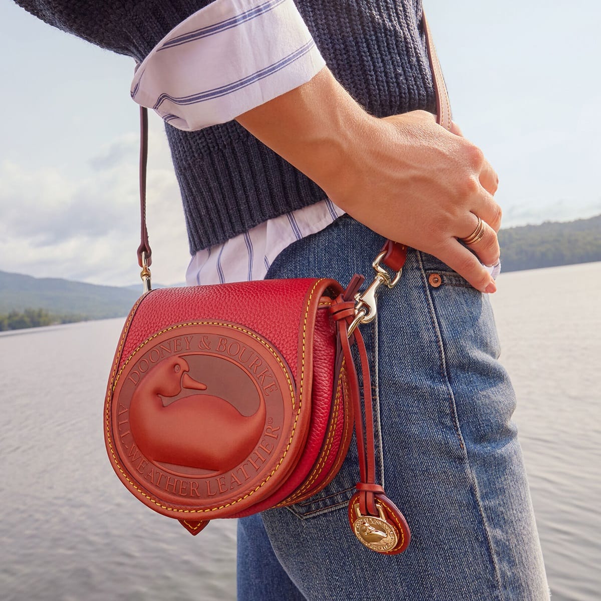 The "All Weather Leather" (AWL) was a defining characteristic of early Dooney Bourke bags, and it was designed to repel water and resist the elements, much like a duck's feathers