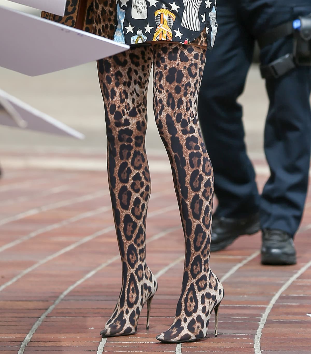 Heidi Klum's thigh-high leopard boots are from Kim Kardashian's curated collection for Dolce Gabbana's Spring 2023 collection