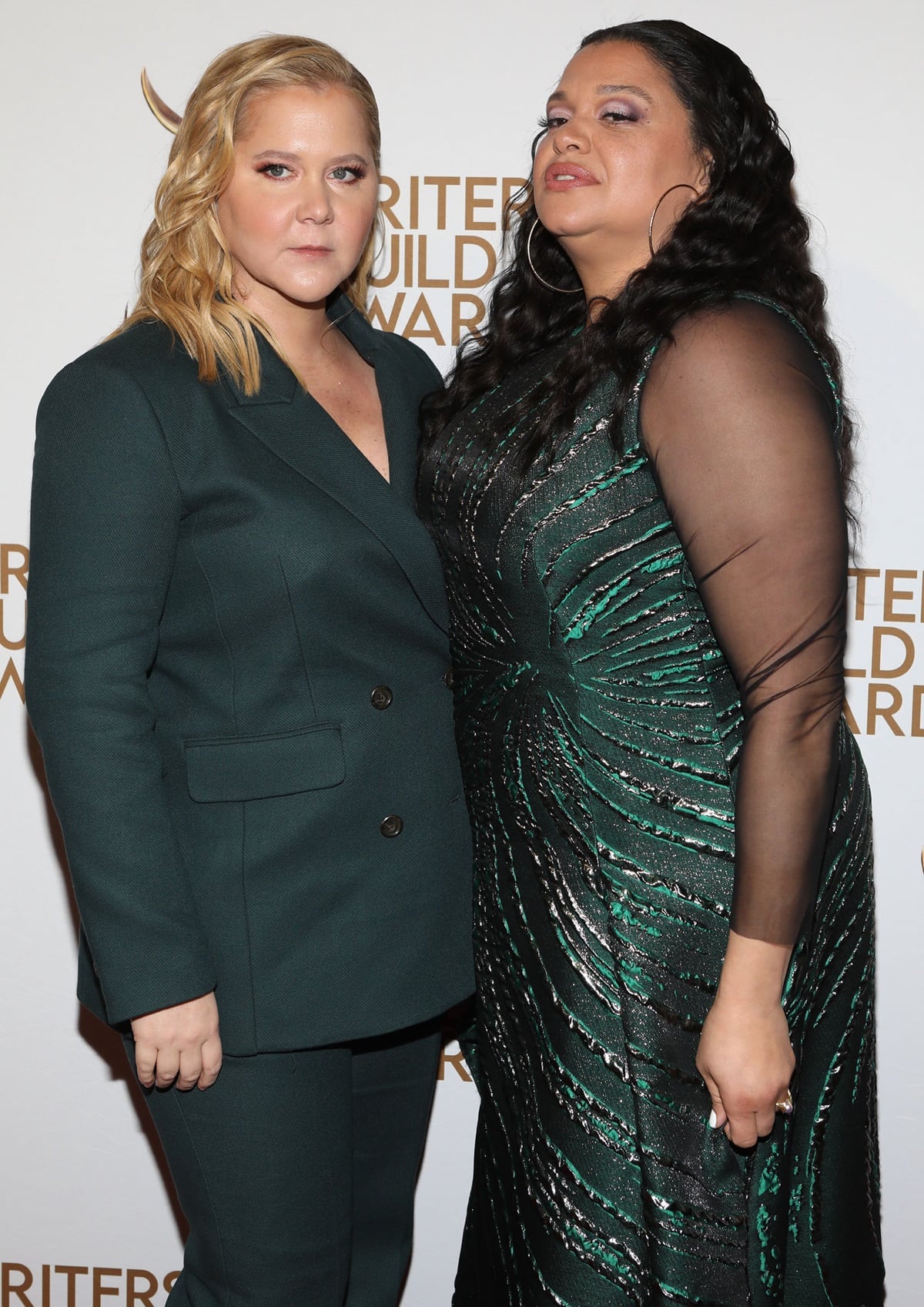 Amy Schumer and Michelle Buteau stunned at the 75th Annual Writers Guild Awards, both opting for elegant, deep green ensembles