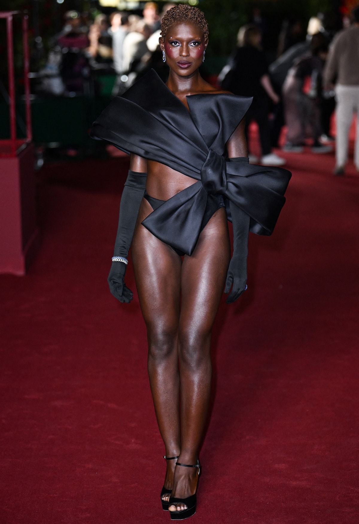 Jodie Turner-Smith making a bold fashion statement in Viktor Rolf Fall 2023 Haute Couture and Rene Caovilla Anastasia platform heels