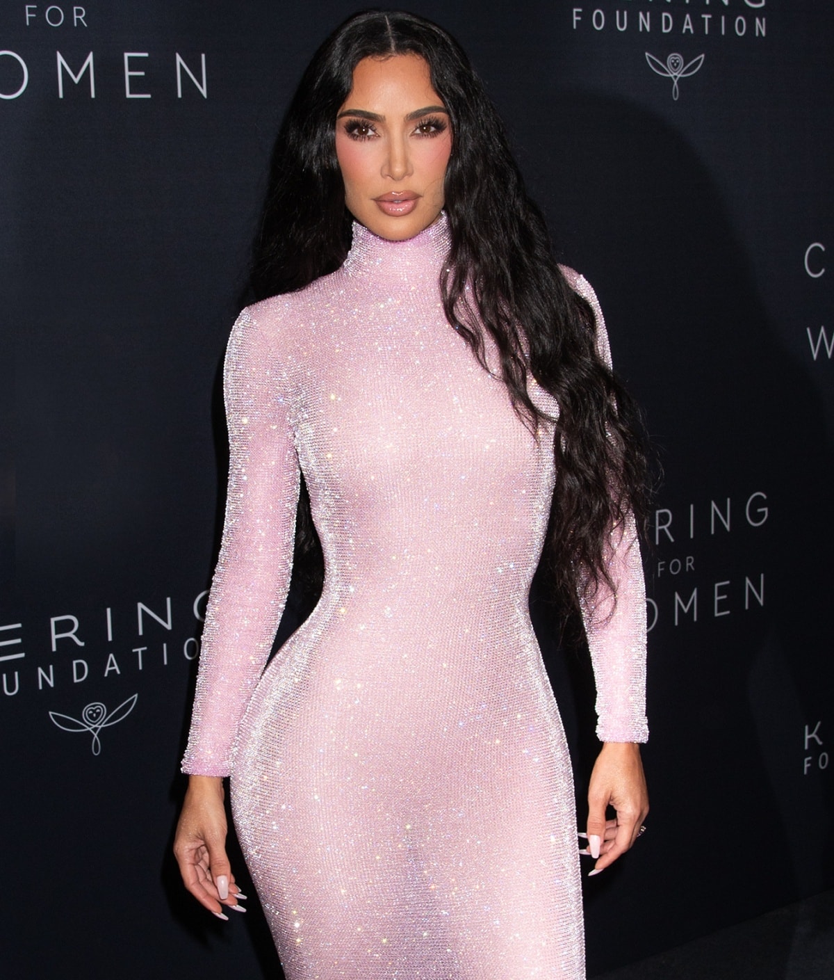 Kim Kardashian flaunting her infamous curves in a skintight Balenciaga evening dress