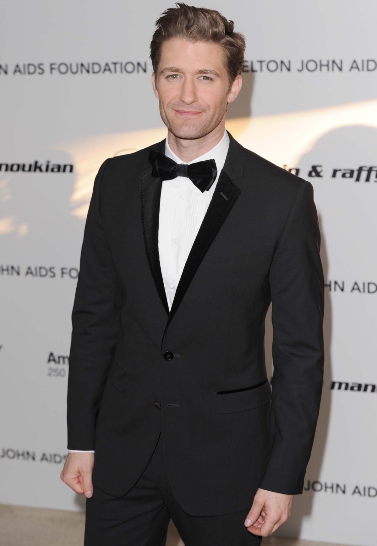 Matthew Morrison looked dapper in a classic black tuxedo with satin lapels and a crisp white shirt, finished with a sleek black bow tie at the Elton John AIDS Foundation event