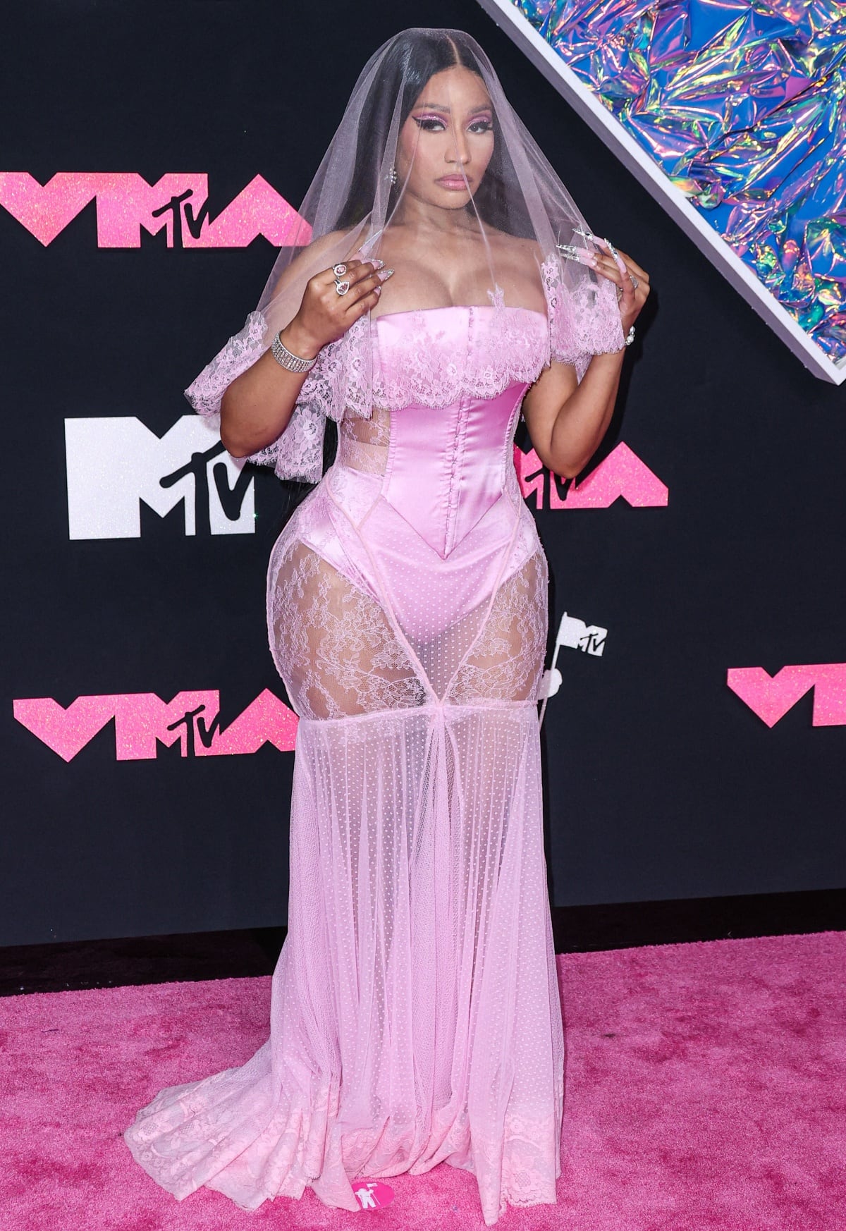 Nicki Minaj embodying a Barbie bride in a pale pink Dolce Gabbana creation at the 2023 MTV Video Music Awards
