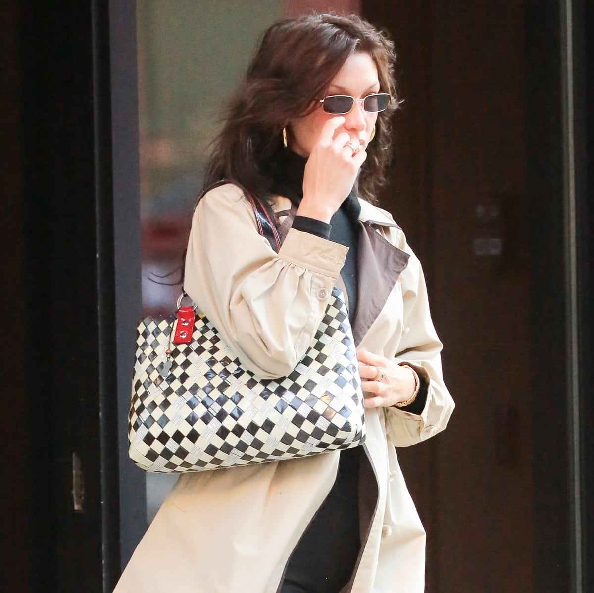 Bella Hadid champions sustainability with her vintage Nahui Ollin handbag, made from upcycled materials, proving that fashion can be both stylish and eco-conscious