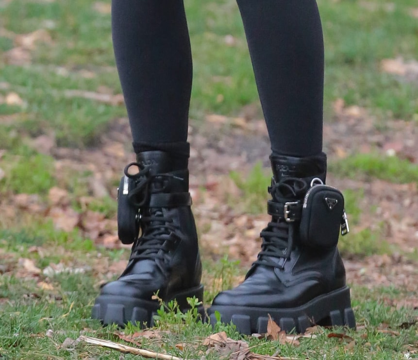 Chrissy Teigen completes her comfy, laid-back look with Prada's Monolith chunky combat boots