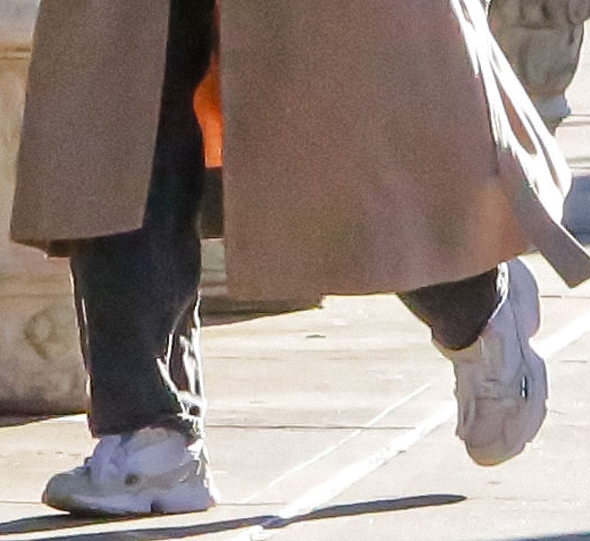 Camila Mendes steps out in chunky white Adidas Falcon sneakers, a retro ’90s-inspired runner reimagined for modern street style