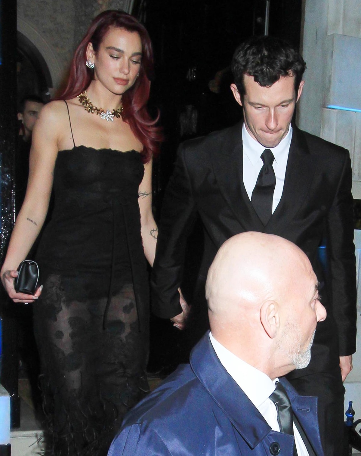 For the British Vogue And Tiffany Co.’s annual Fashion and Film party at Annabel's nightclub, Dua Lipa chose a sheer black Valentino floral lace gown from the Pre-Fall 2024 couture collection