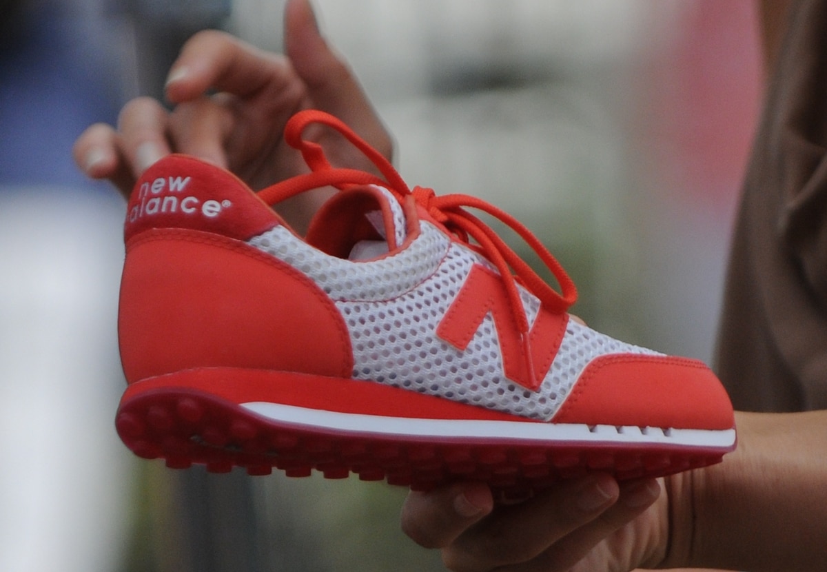 New Balance is known for its comfort-driven designs and defining "N" logo, offering a blend of performance and style in the world of athletics and casual wear