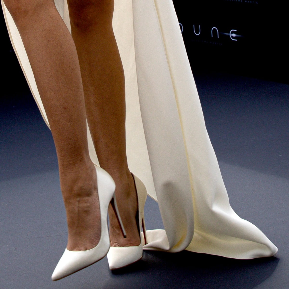 Styled with minimalist white Christian Louboutin So Kate pumps, Zendaya's look is a testament to her fashion-forward sensibility