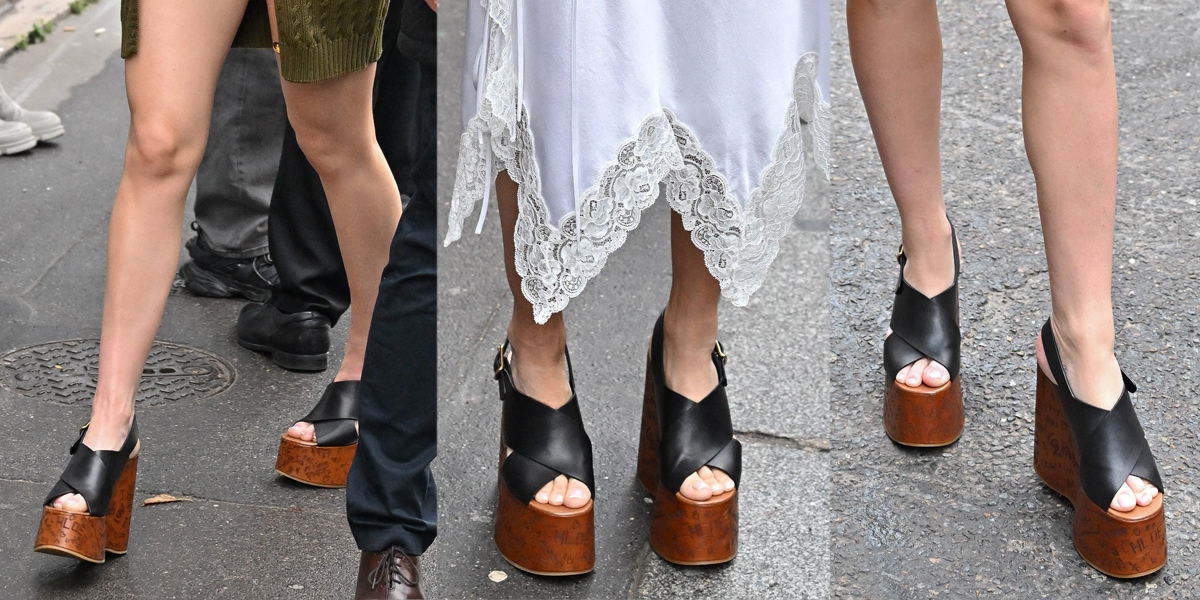 Celebrities step out in matching Chloé “Maxime” wedge sandals — featuring engraved wooden soles and black leather crossover straps — at the brand’s Fall/Winter 2024–2025 presentation during Paris Fashion Week on February 29, 2024