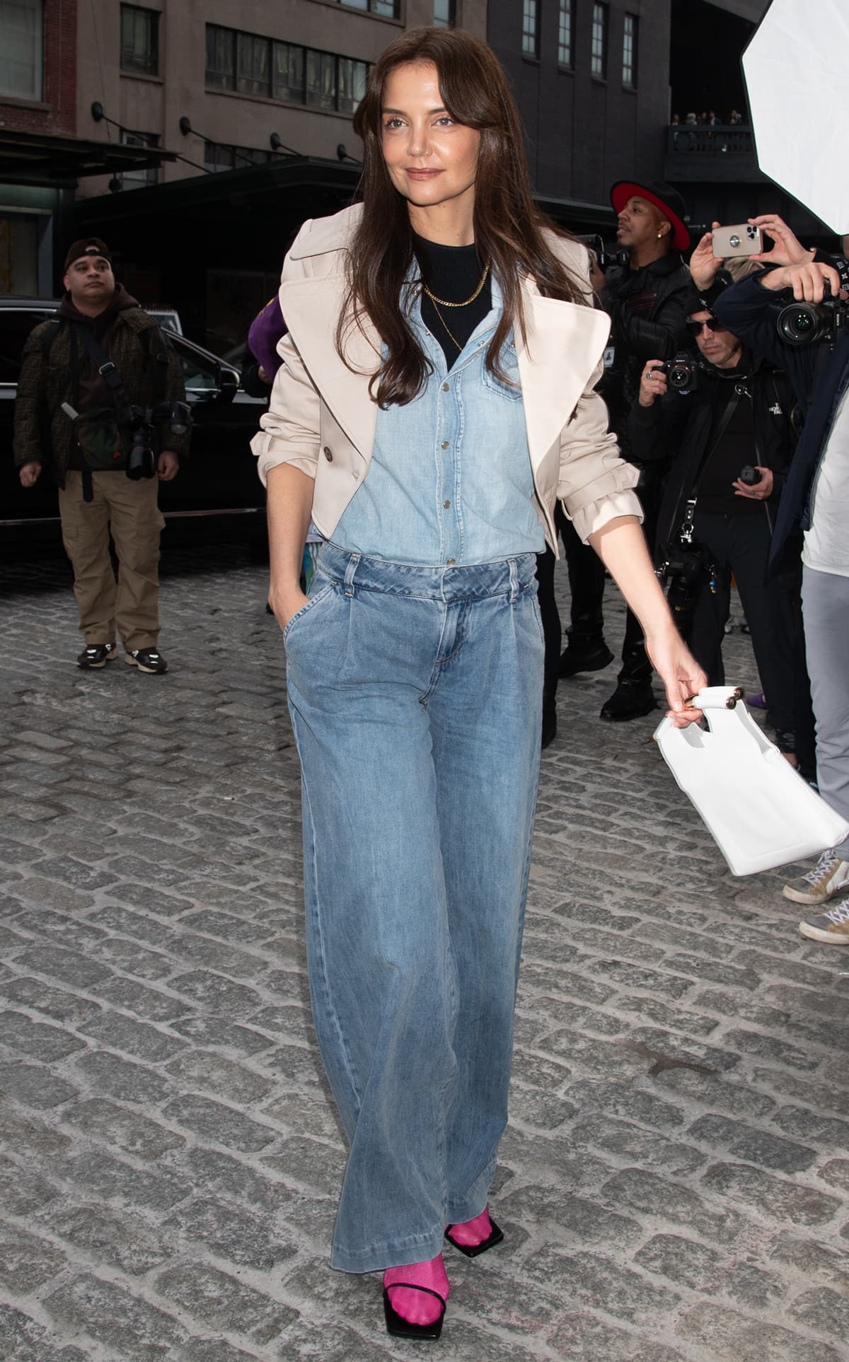 Katie Holmes showcases her flair for unconventional fashion with a double denim look and colorful accessories at Chelsea’s Highline Stages event