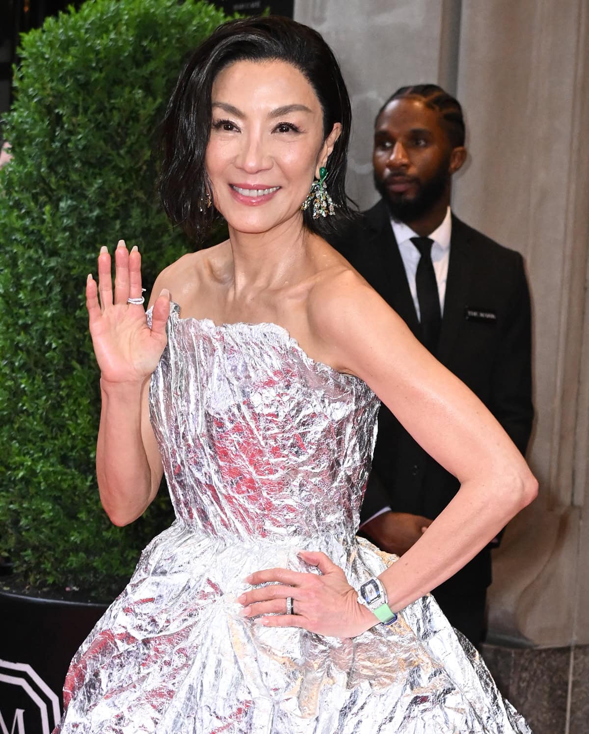Michelle Yeoh adds nature-inspired elements to her aluminum foil gown with emerald Cindy Chao jewelry and a green Richard Mille watch
