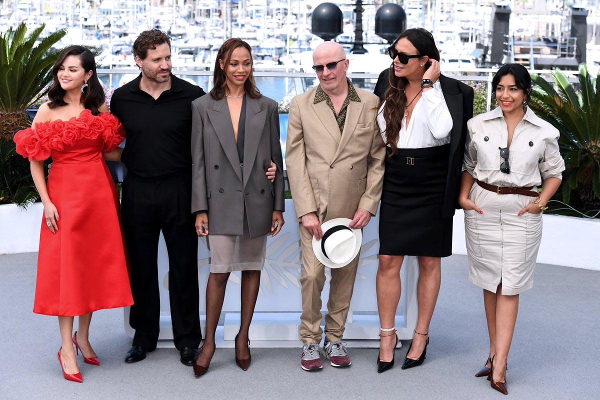 Selena Gomez, Édgar Ramírez, Zoe Saldaña, Jacques Audiard, Karla Sofía Gascón and Adriana Paz attend the "Emilia Perez" Photocall at the 77th annual Cannes Film Festival at Palais des Festivals on May 19, 2024 in Cannes, France