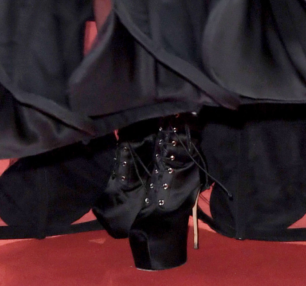 Lady Gaga adds an edgy element to the elegant Dior gown with Giuseppe Zanotti lace-up platform boots
