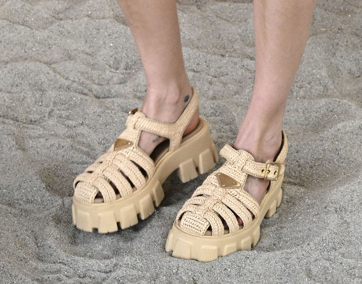 Cara Delevingne makes a statement in Prada's Monolith sandals featuring a crocheted caged upper