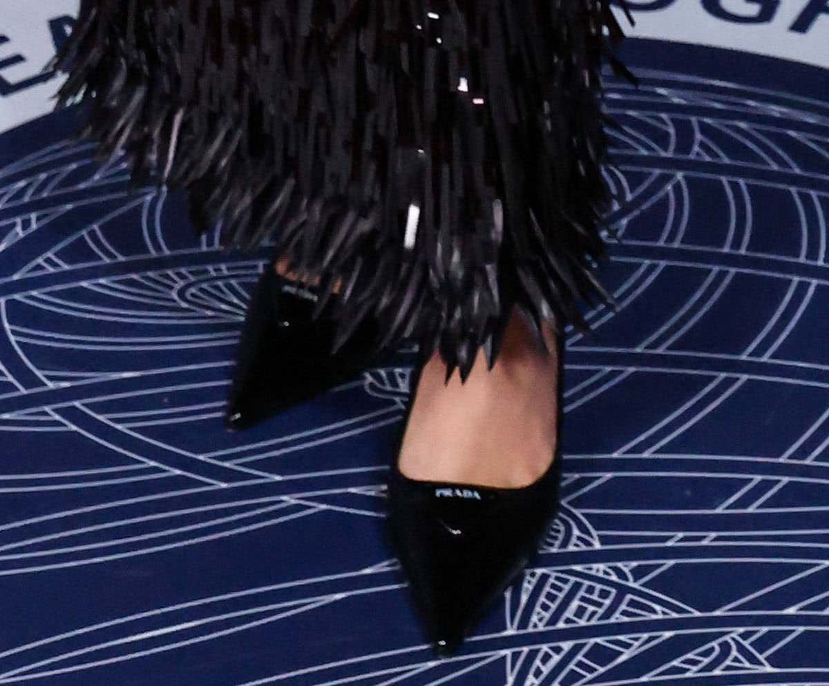 Gal Gadot opts for the basic, wearing Prada's classic slingback pumps with a puffy triangle logo on the vamp