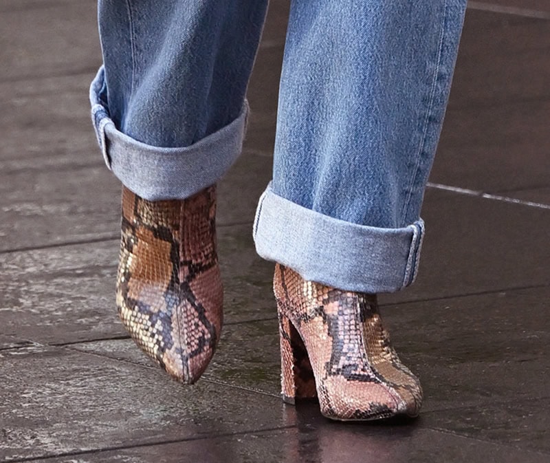 Anne Hathaway adds exotic glamour to her casual fit with Zadig Voltaire Glimmer Wild ankle boots