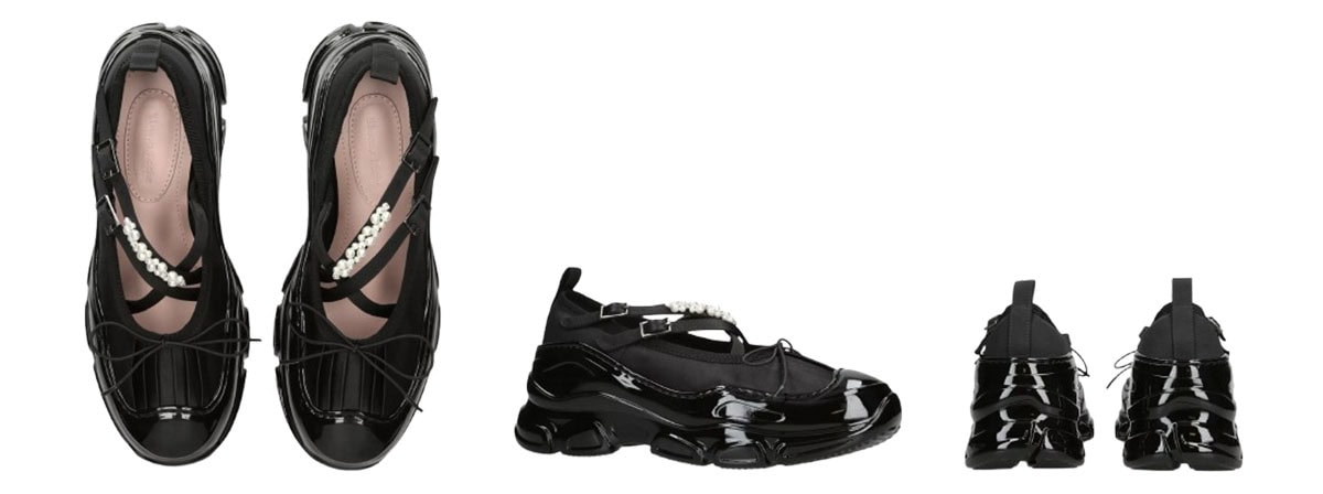 Simone Rocha “Tracker Mesh” ballerina trainers combine romantic ballet details with a chunky track sole, finished with crisscross straps, pearl embellishments, and glossy black accents