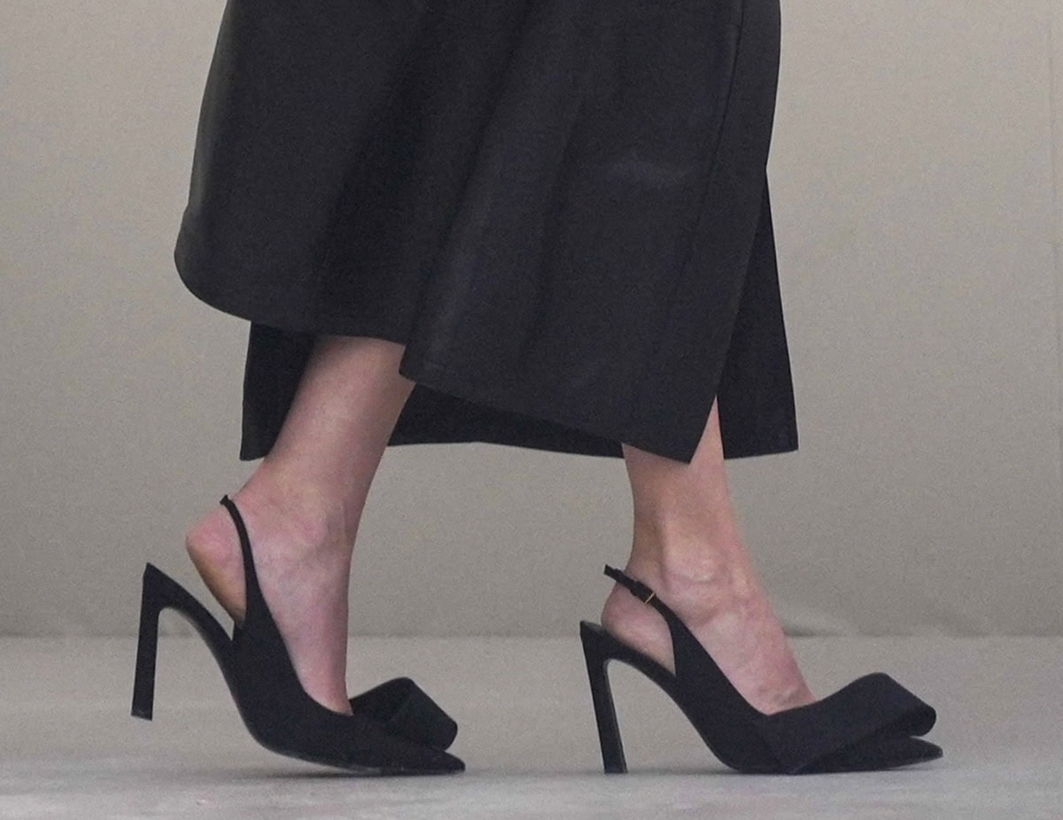Diane Kruger slips into a pair of Givenchy bow slingback pumps with slanted heels