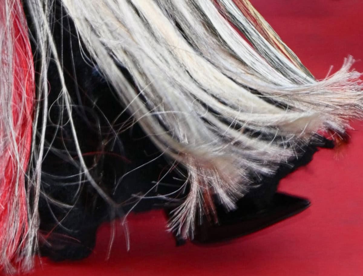 Cate Blanchett slips into a simple pair of black patent pumps with pointed toes and slim heels