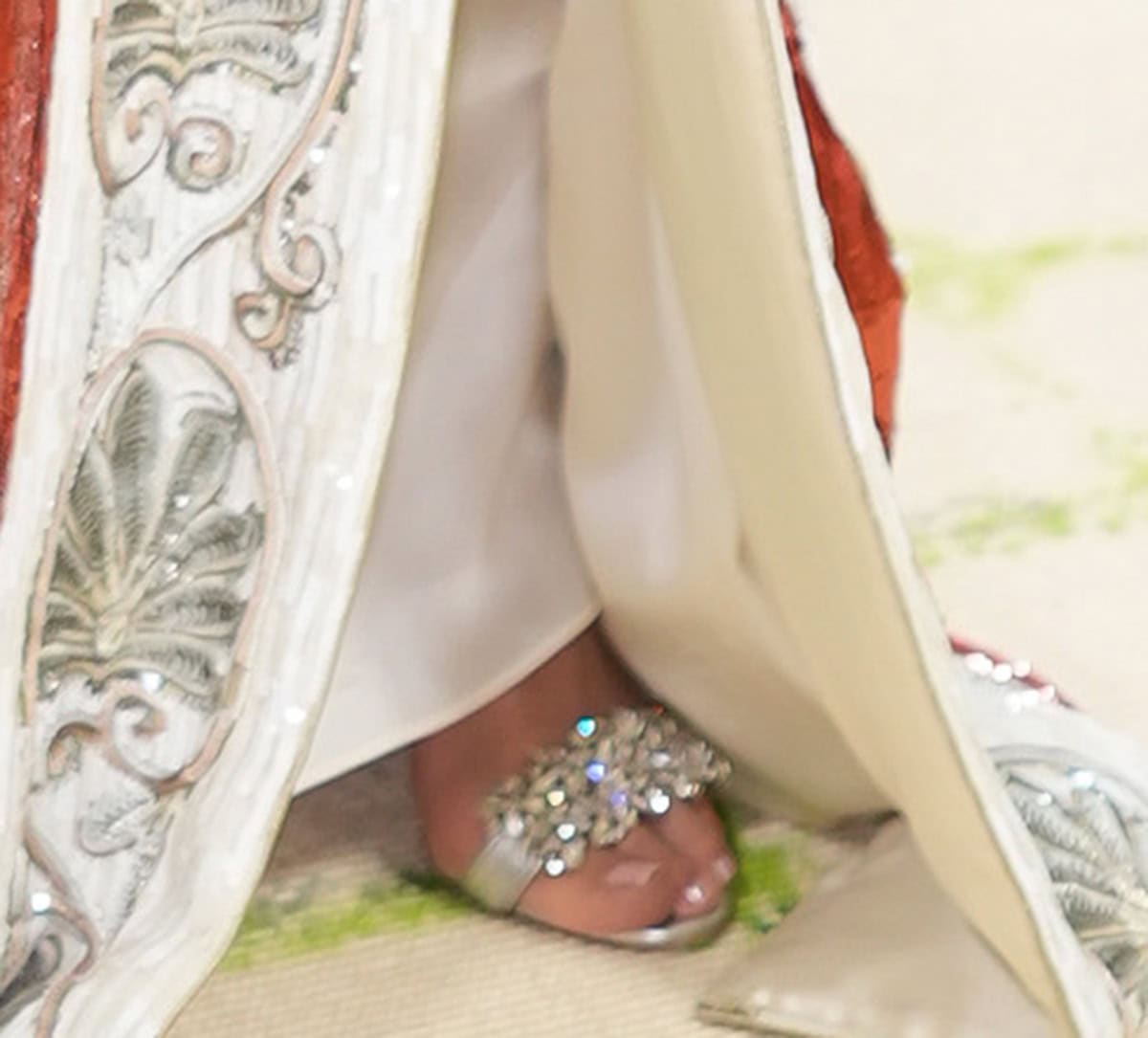 Kris Jenner elevates her kimono dress with silver crystal-encrusted Manolo Blahnik sandals