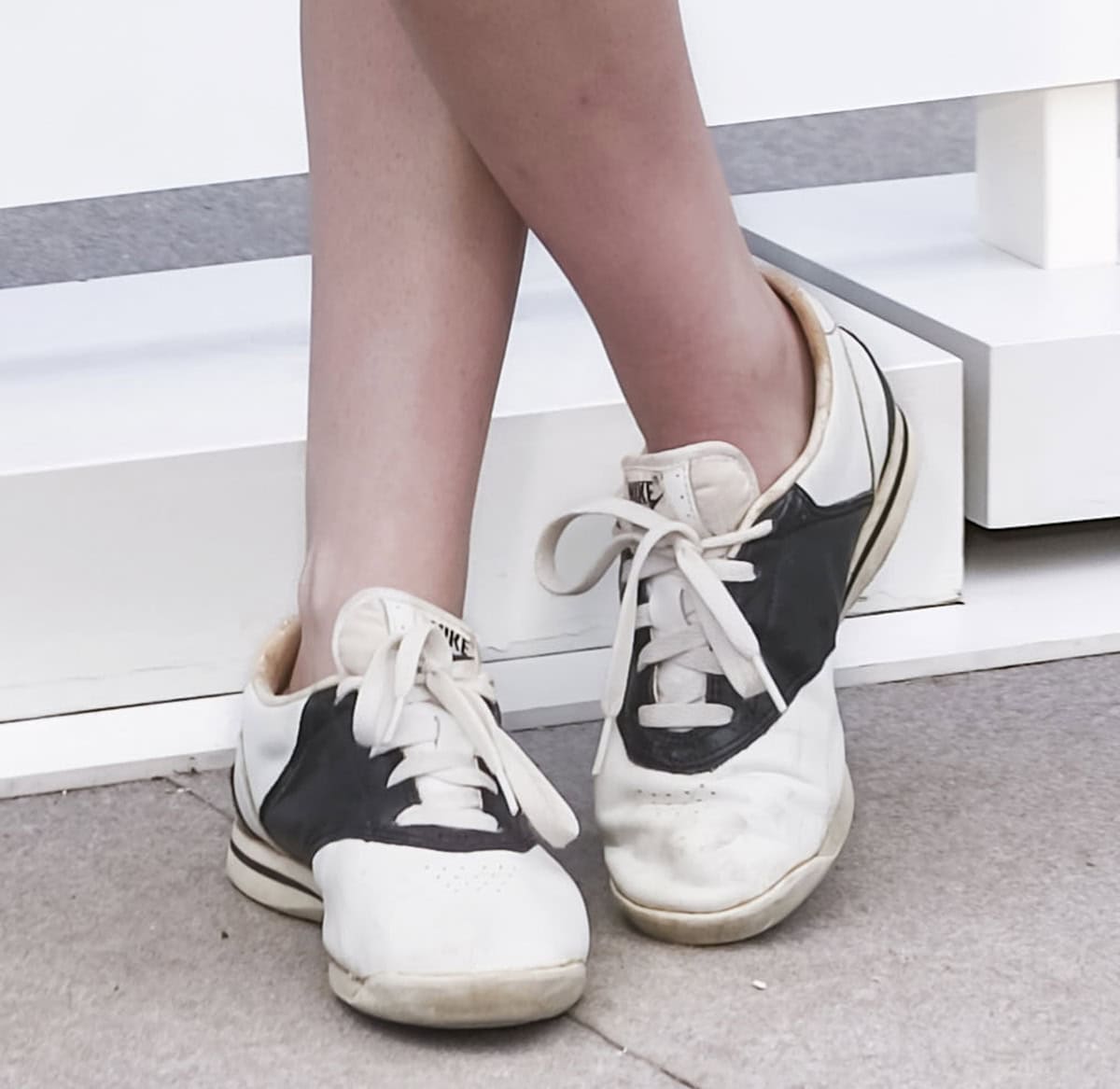 Kristen Stewart keeps it laid-back for the Full Phil Cannes photocall, wearing a pair of vintage black-and-white Nike saddle oxford sneakers complete with perforations