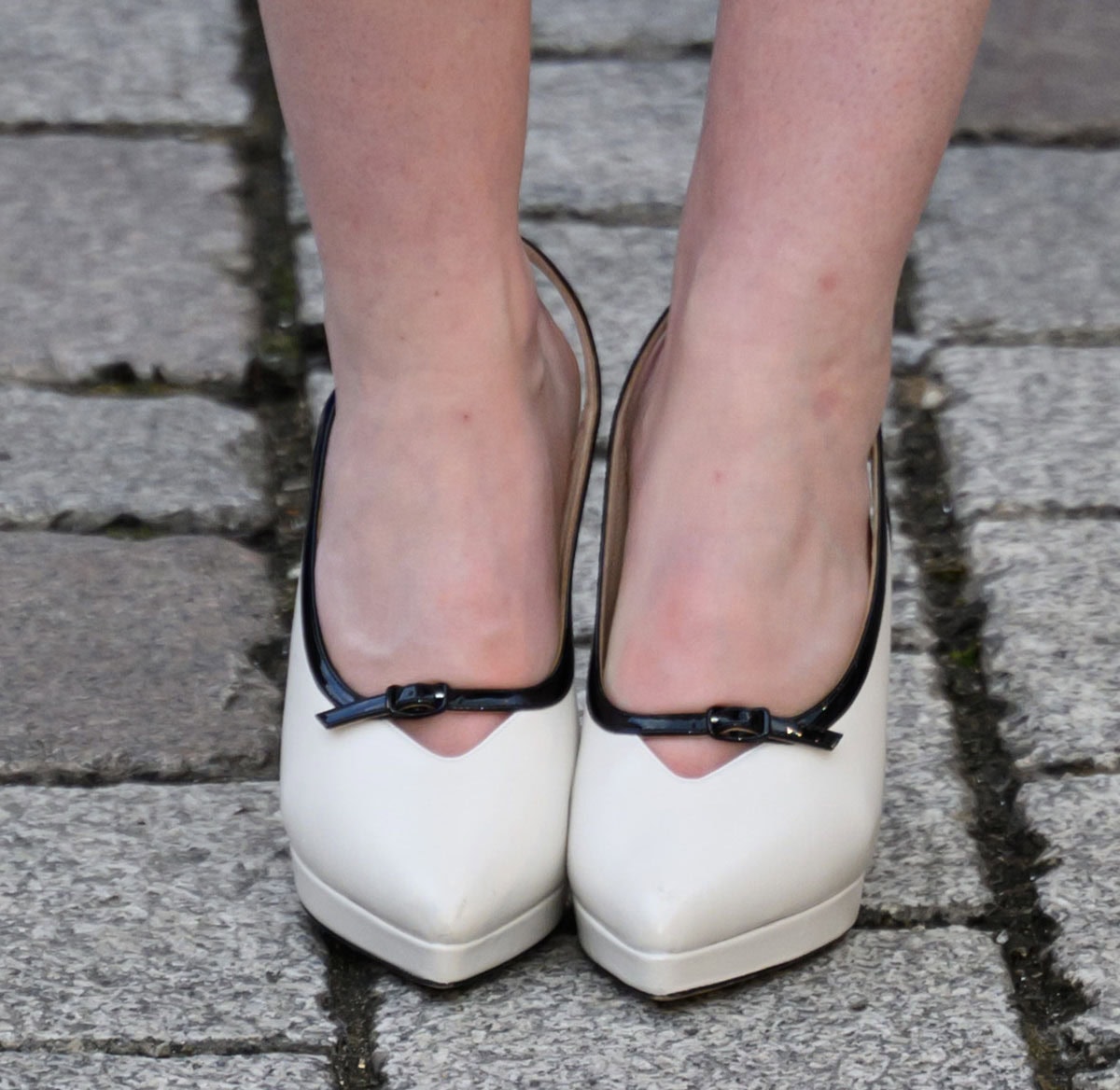 Catriona Chandler opts for the sophisticated Casadei “Michelle” pointed pumps in cream leather with glossy black patent trims