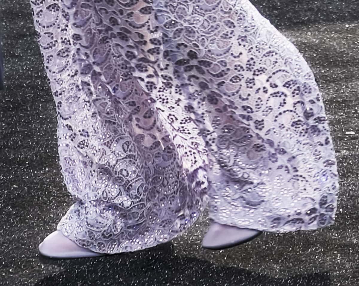 Emily Blunt steps out in Stella McCartney lilac vegan stretch mesh pumps with a slingback strap and stiletto heels