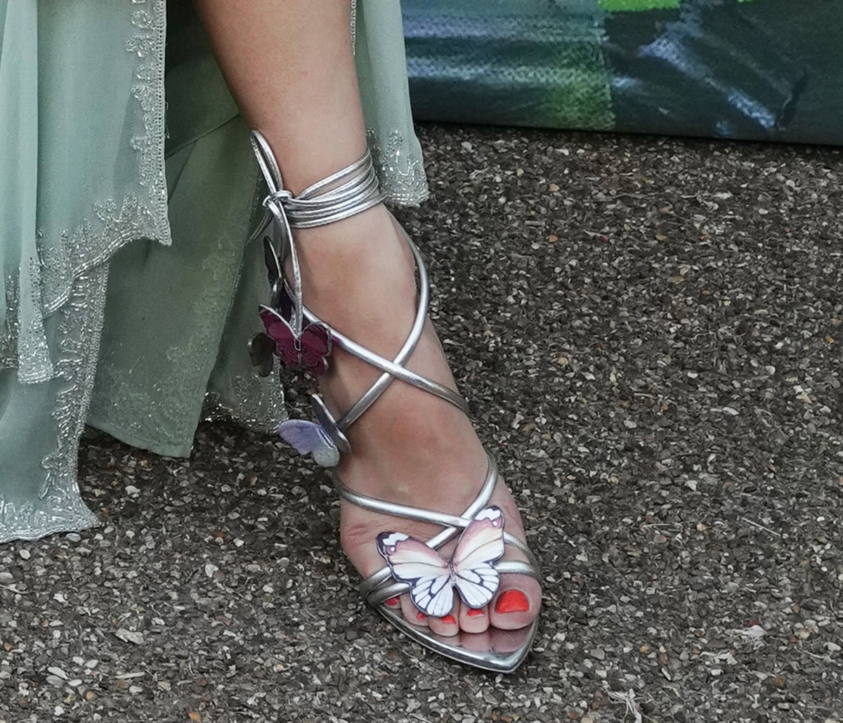 Pixie Lott goes whimsical with her Sophia Webster “Vanessa” sandals featuring a strappy upper with 3D butterfly appliques