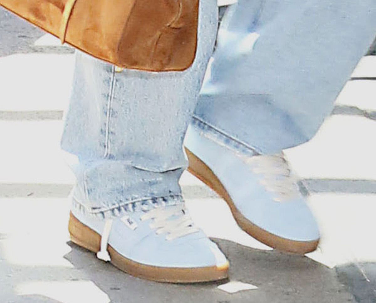 Florence Pugh goes for comfy kicks, wearing the P448 “Monza” sneakers in light blue suede with white laces and gum rubber soles