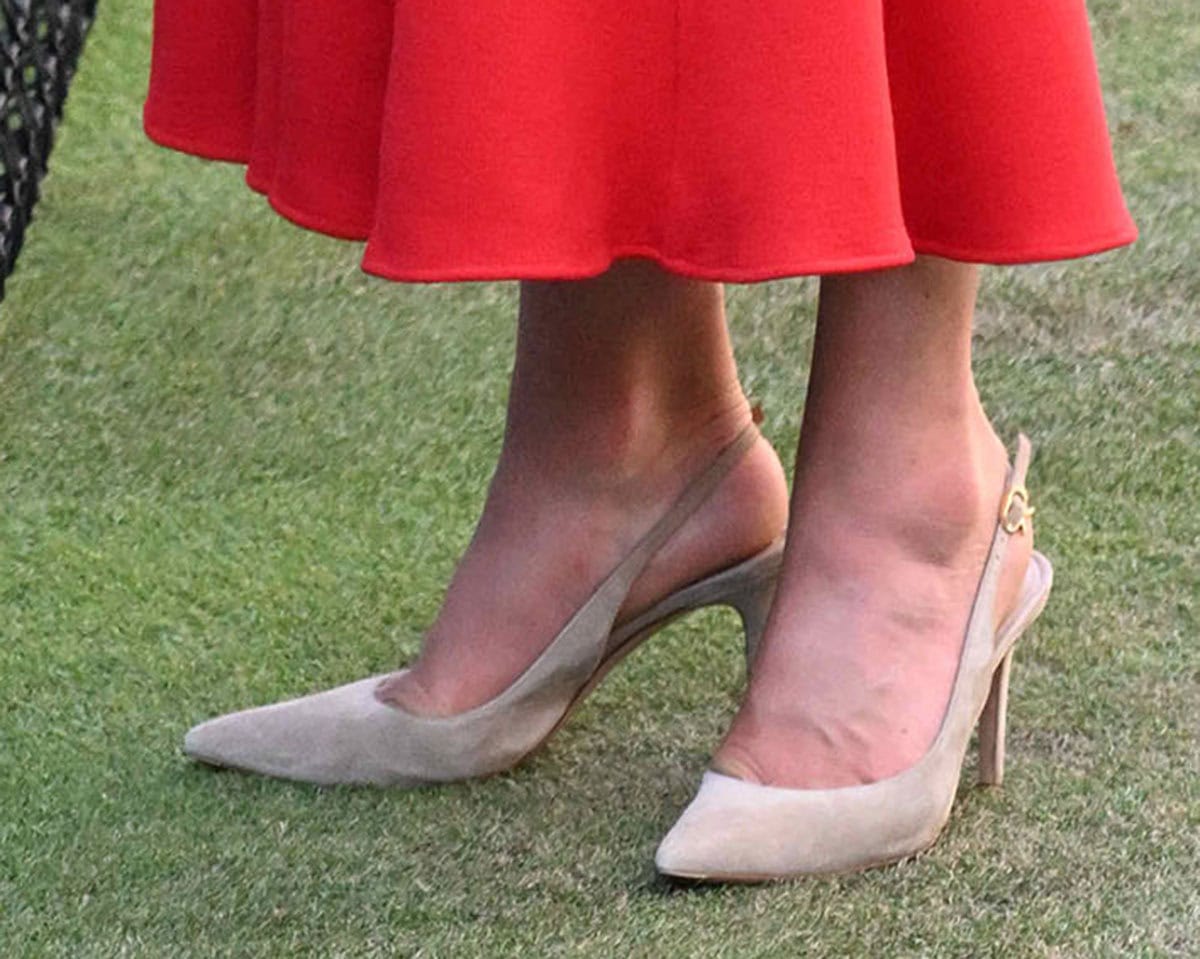 Kate Middleton wears the Gianvito Rossi “Ribbon Sling” slingback pumps in soft, neutral suede featuring the brand's iconic gold-tone Ribbon buckle for Day 13 of the 2026 Wimbledon Championships