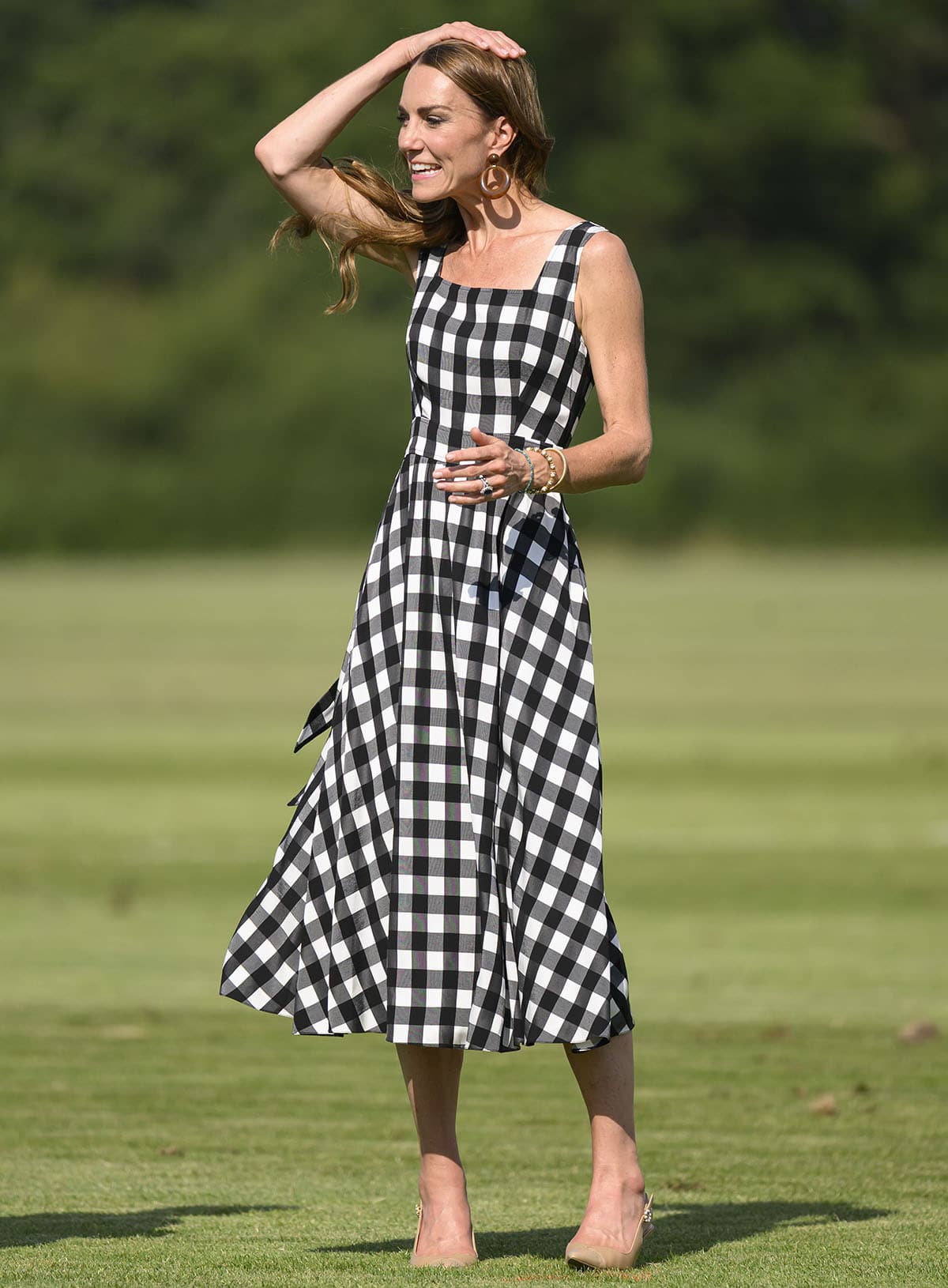 Kate Middleton teams her slingbacks with a summery black-and-white gingham midi dress by Temperley London for the DMMI Royal Charity Polo Cup at Guards Polo Club Windsor