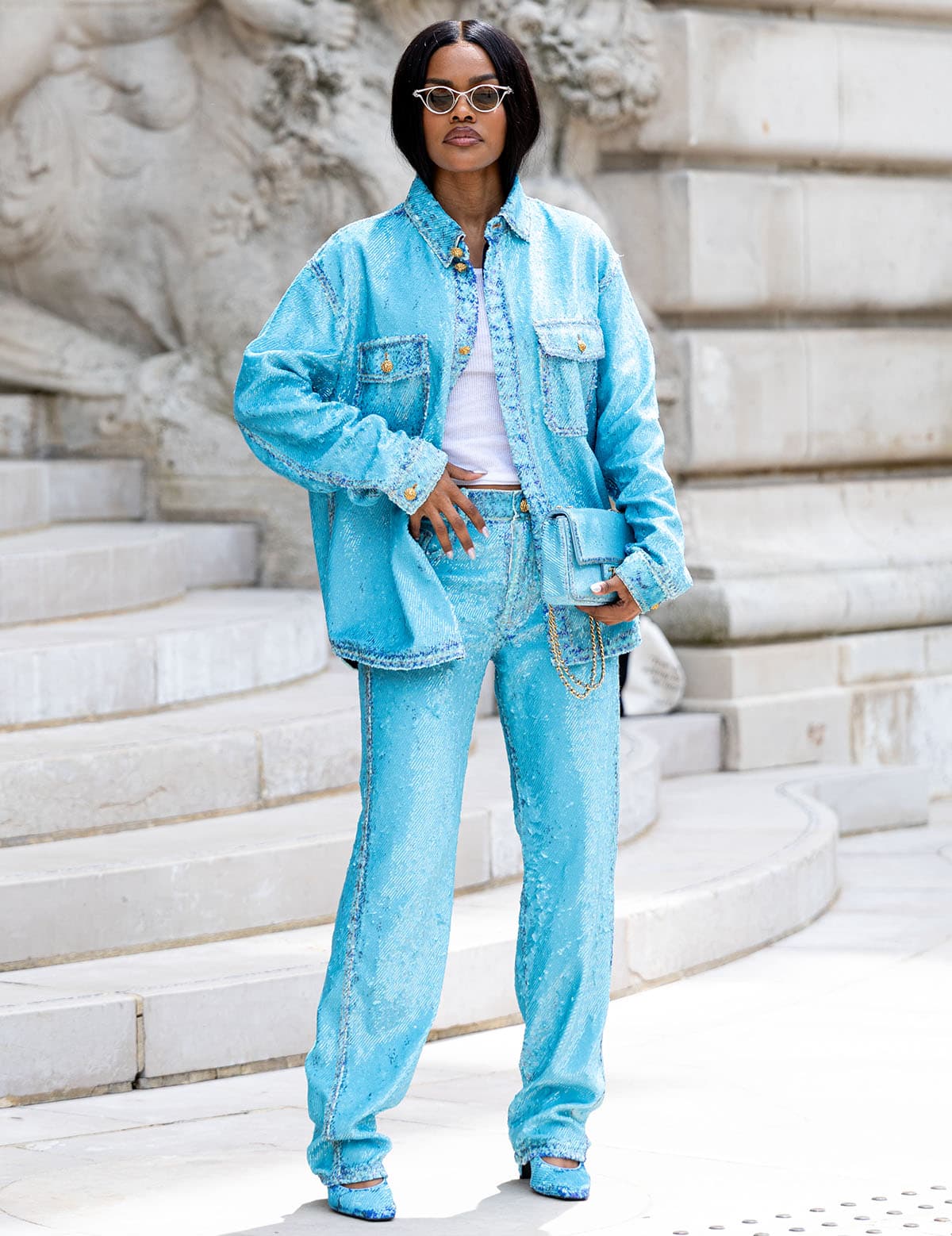 Teyana Taylor matches her pumps with her Canadian Tuxedo, featuring a baby blue sequin-embellished denim jacket and matching pants