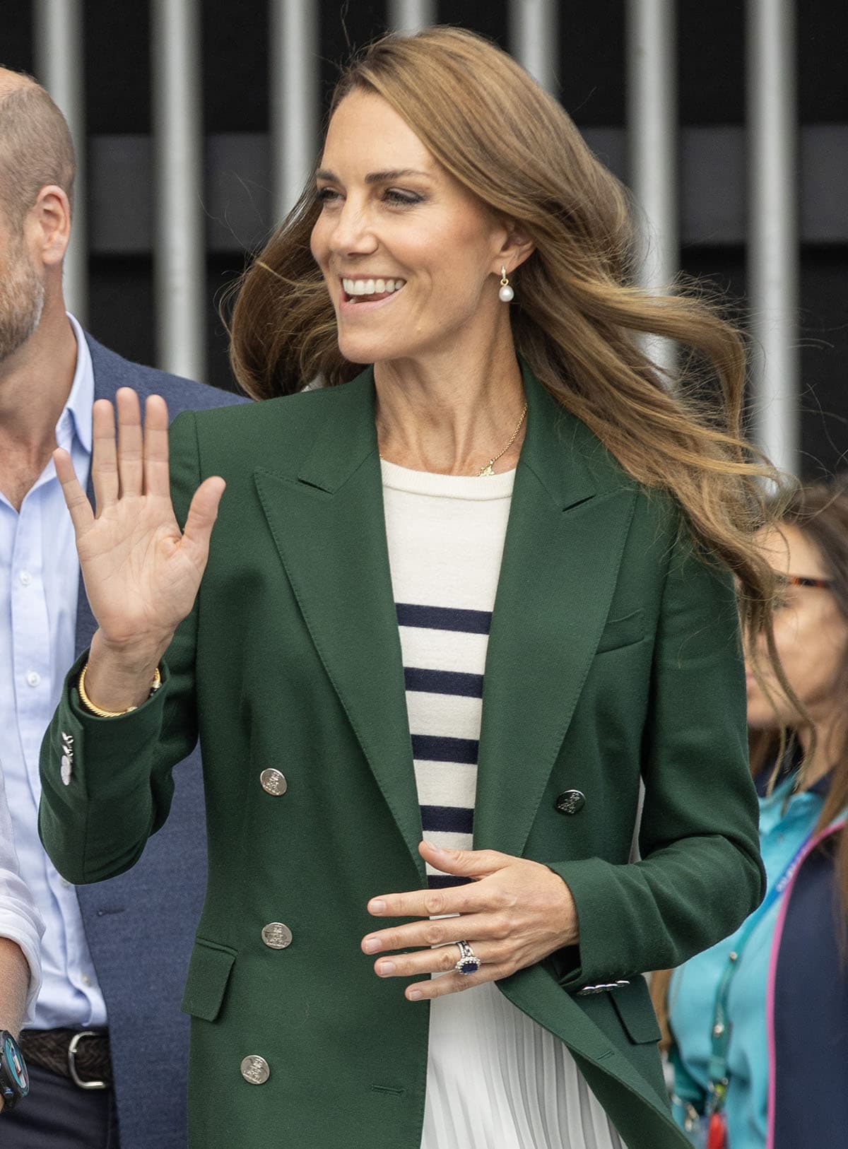 Kate Middleton completes her look with jewelry, including a Daniella Draper Gold Trio Mini Star necklace and a mix of the Annoushka gold Baroque pearl drop earrings and Kiki McDonough gold diamond hoops