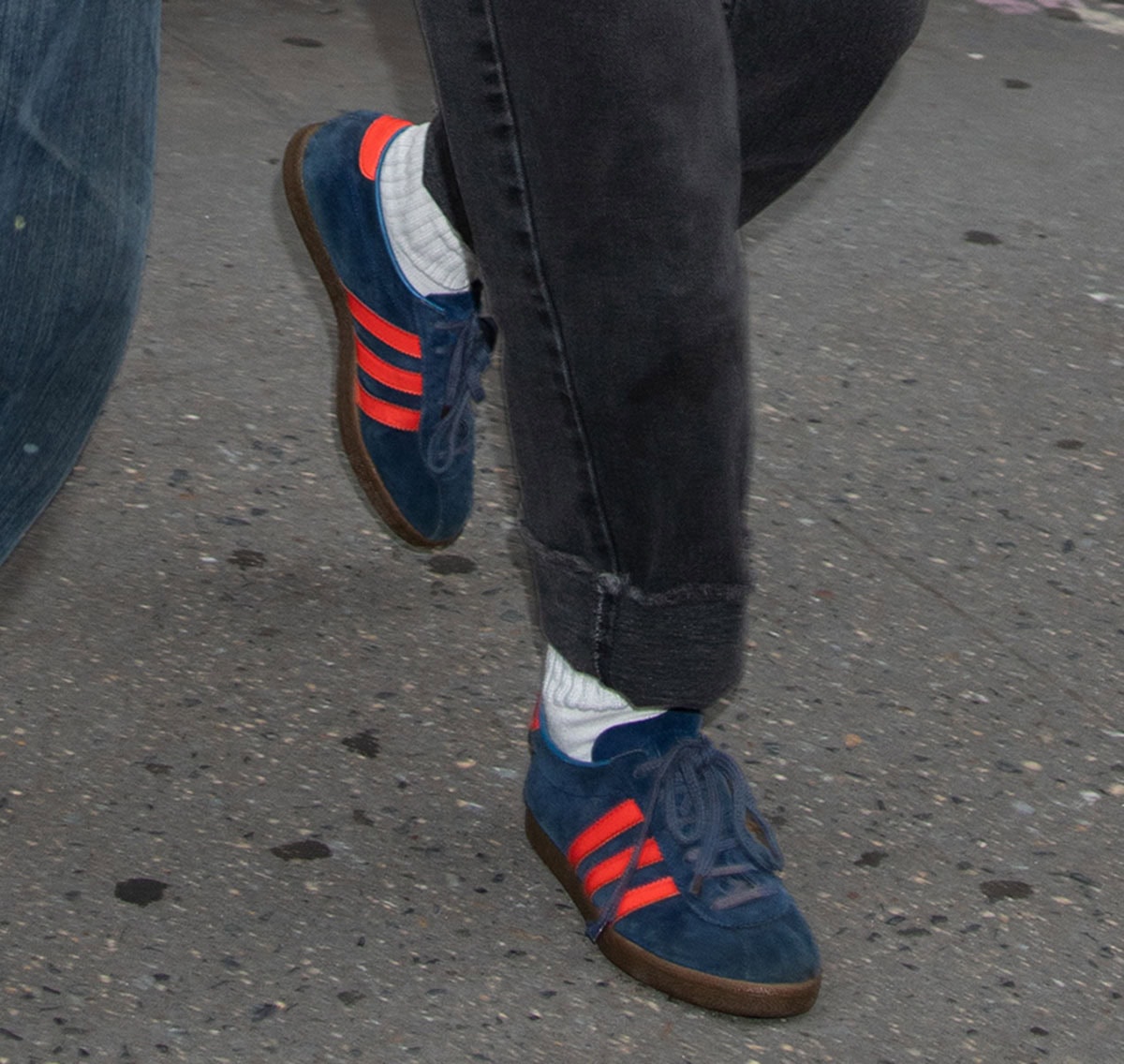 Kristen Stewart slips into a pair of Adidas “Dublin” sneakers in Collegiate Royal suede uppers with bright Solar Red stripes