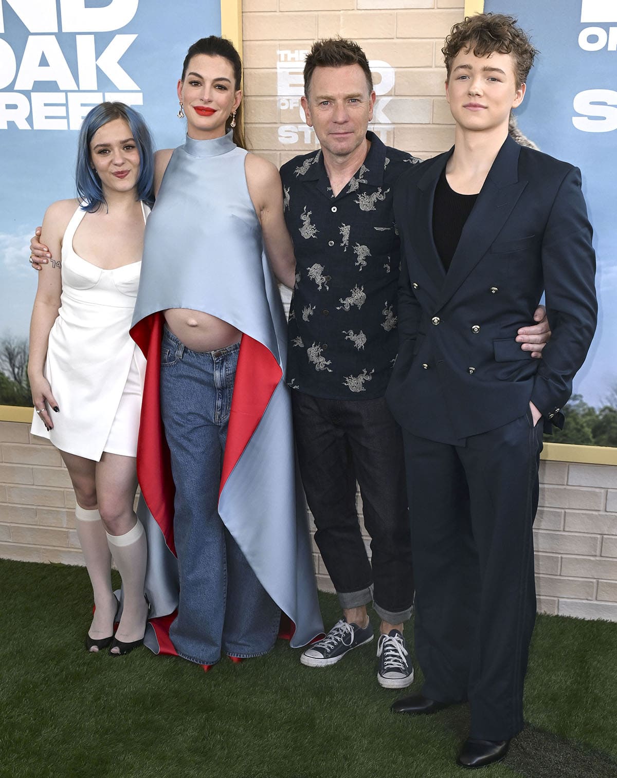 Maisy Stella, Anne Hathaway, Ewan McGregor, and Christian Convery attend The End of Oak Street premiere in Los Angeles