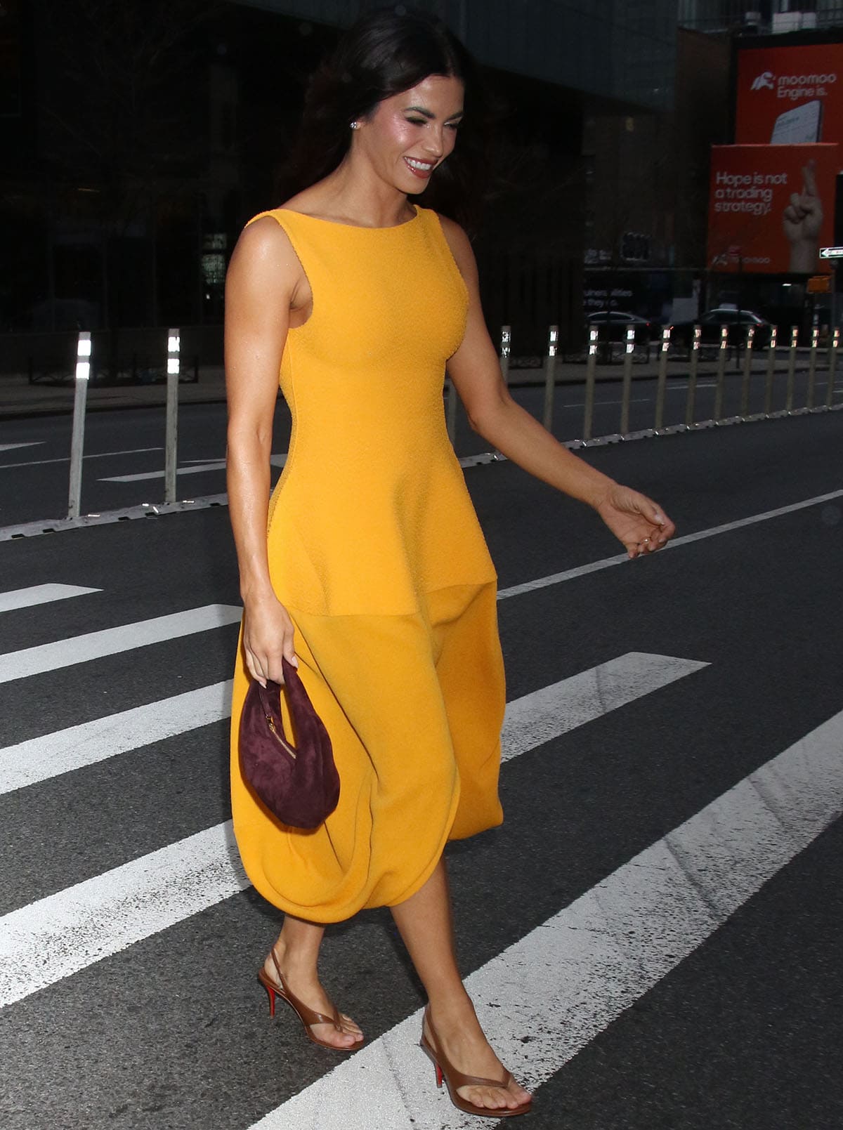 Jenna Dewan wearing a summery yellow Proenza Schouler dress with brown Christian Louboutin thong heels while promoting Dancing with the Stars Season 35