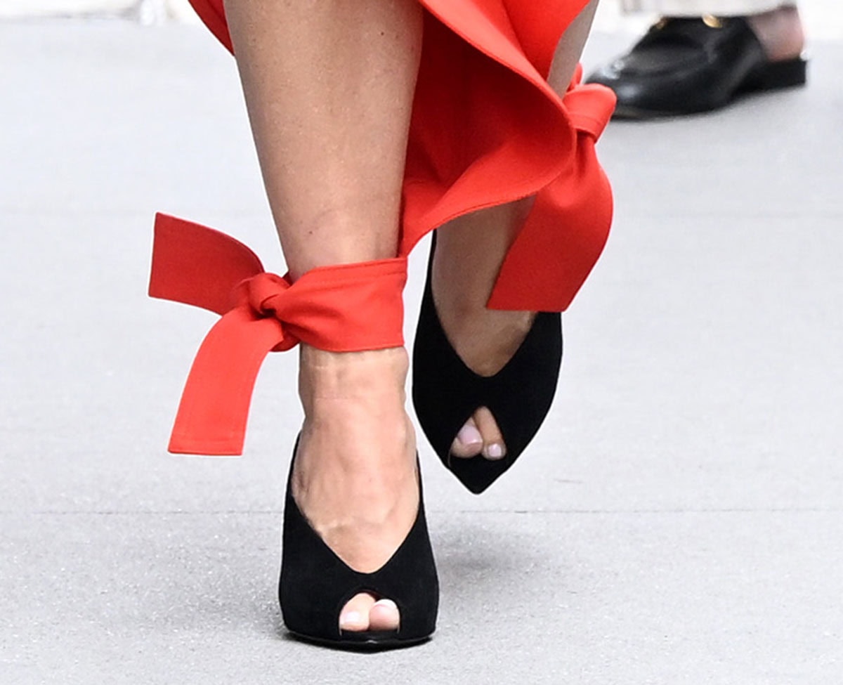Julianne Hough gives her summery outfit an edgy twist with the Giuseppe Zanotti “Intriigo Cluedo” mules featuring a sculptural vamp, pointed peep toes, and stiletto heels